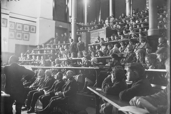 Lantern slide illustrated lecture. Here we see a glass plate negative capturing audience viewing lantern slides used to illustrate K.R Kinghorn's Seashore lecture titled 'Flashlight'.  Dated 22 July 1924. AMS351/V03935.