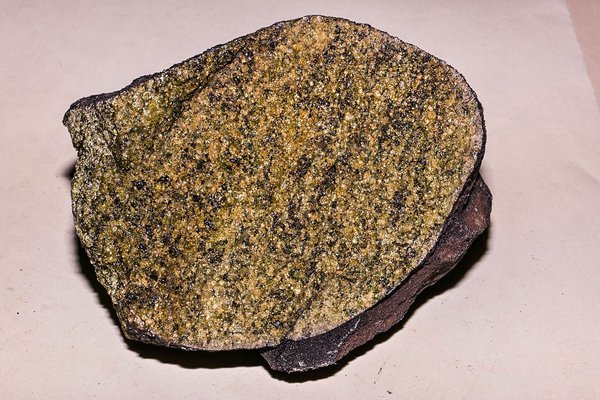 Figure 1. DR.19319 Olivine in volcanic bomb from the Australian Museum collection