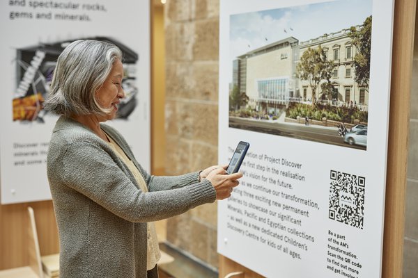 Visitor scanning QR code